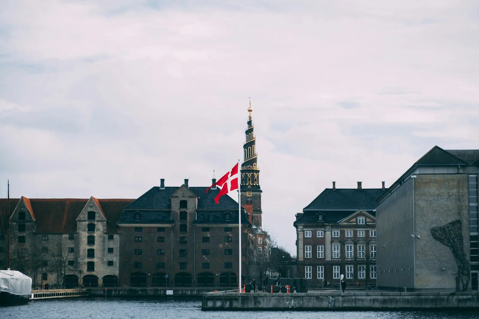 a large building with a flag on top of it